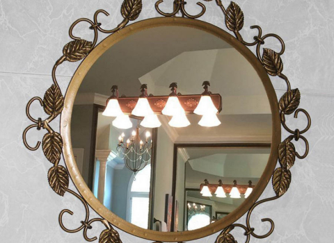 Круглое кованое зеркало с листьями КЗР-052